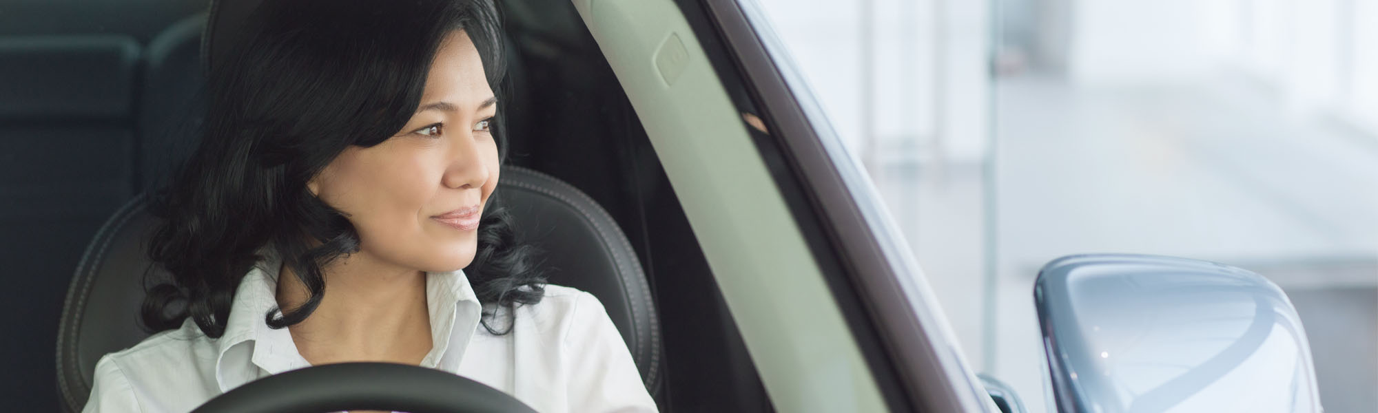 Woman Looking Out of Car Window